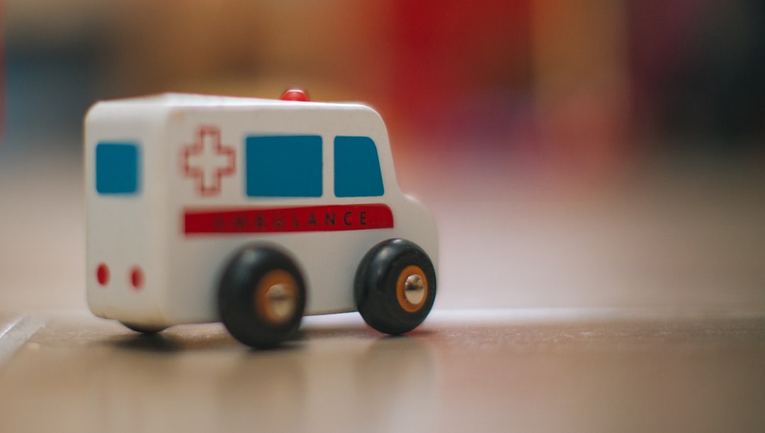 Photo by Mpho Mojapelo a toy ambulance is sitting on the floor
